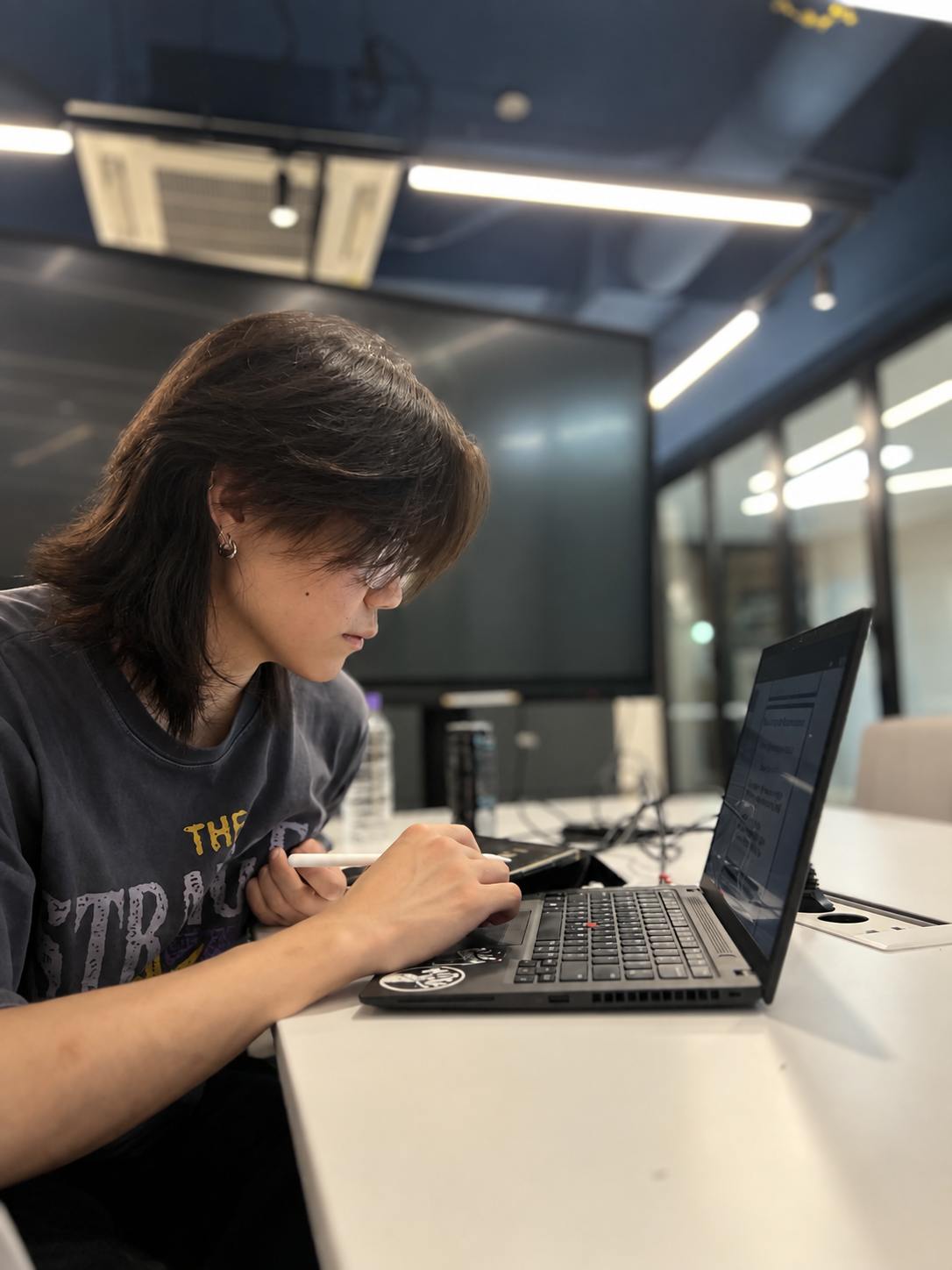 Temuujin Gerelt-Och working on a laptop